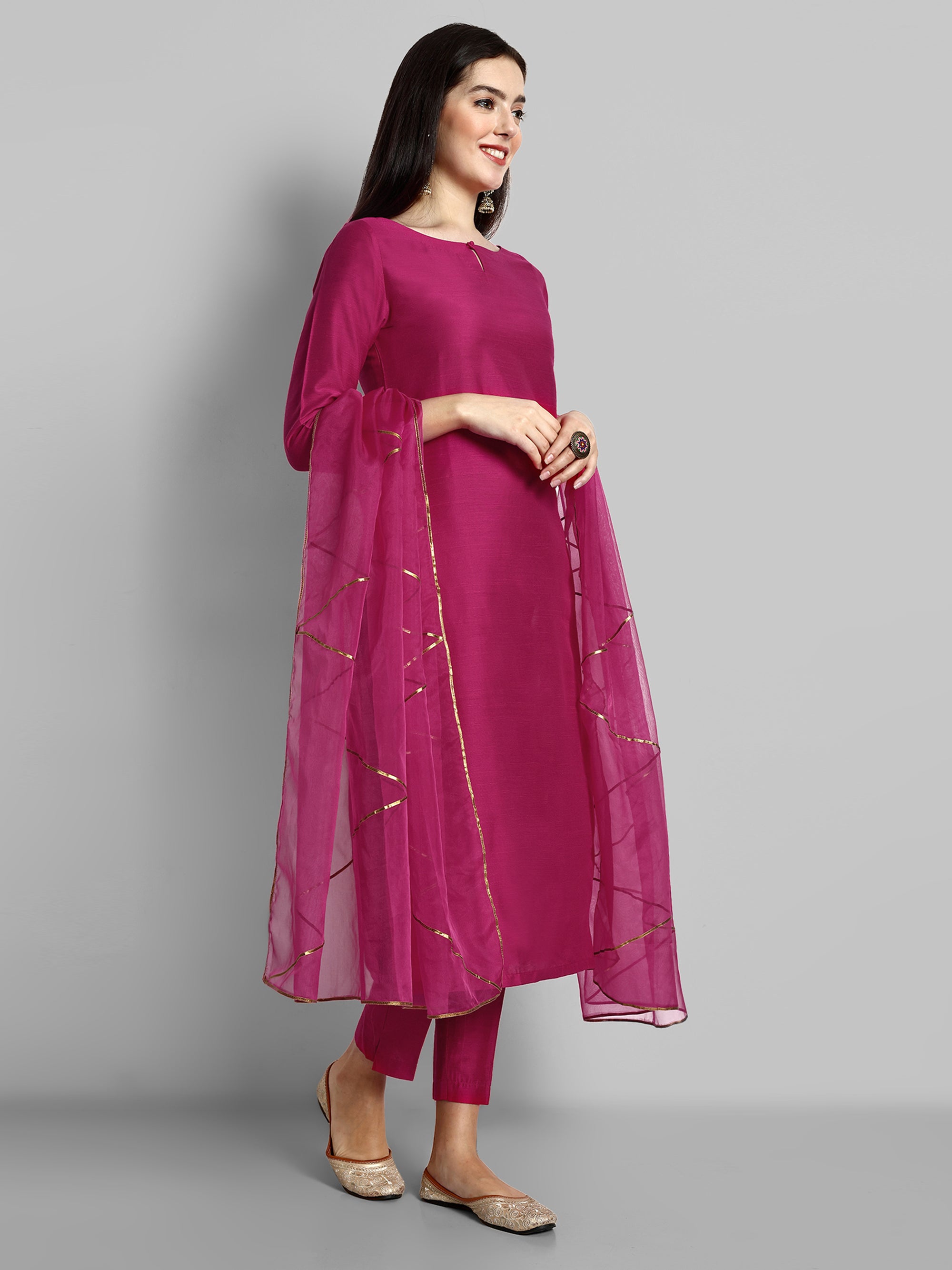 Hot Pink key hole boat neck kurta paired with elasticated pants and an organza dupatta - a stylish set of three for a sophisticated and coordinated look