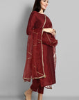 Maroon boat neck kurta paired with elasticated pants and an organza dupatta - a stylish set of three for a sophisticated and coordinated look