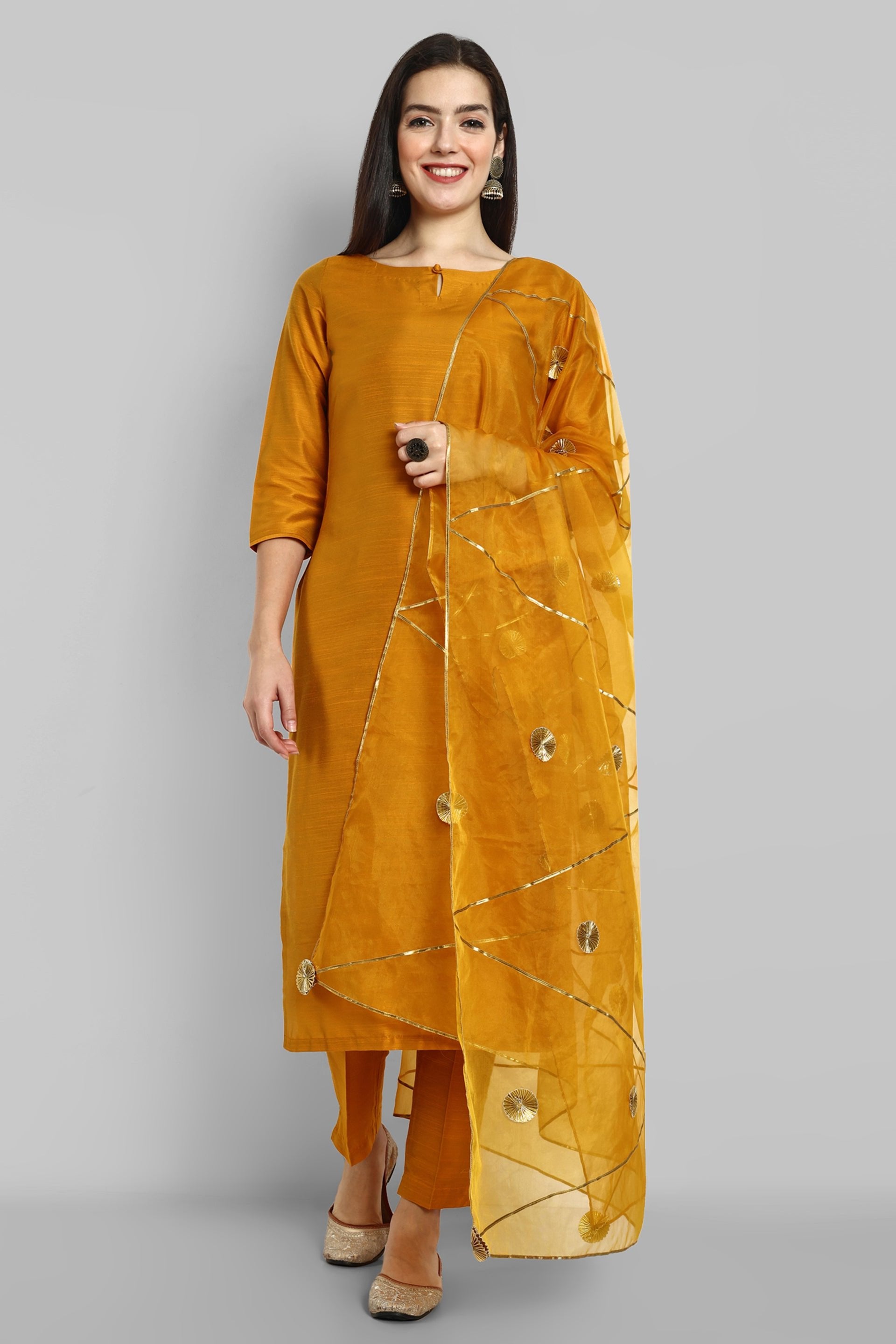 Mustard key hole boat neck kurta paired with elasticated pants and an organza dupatta - a stylish set of three for a sophisticated and coordinated look