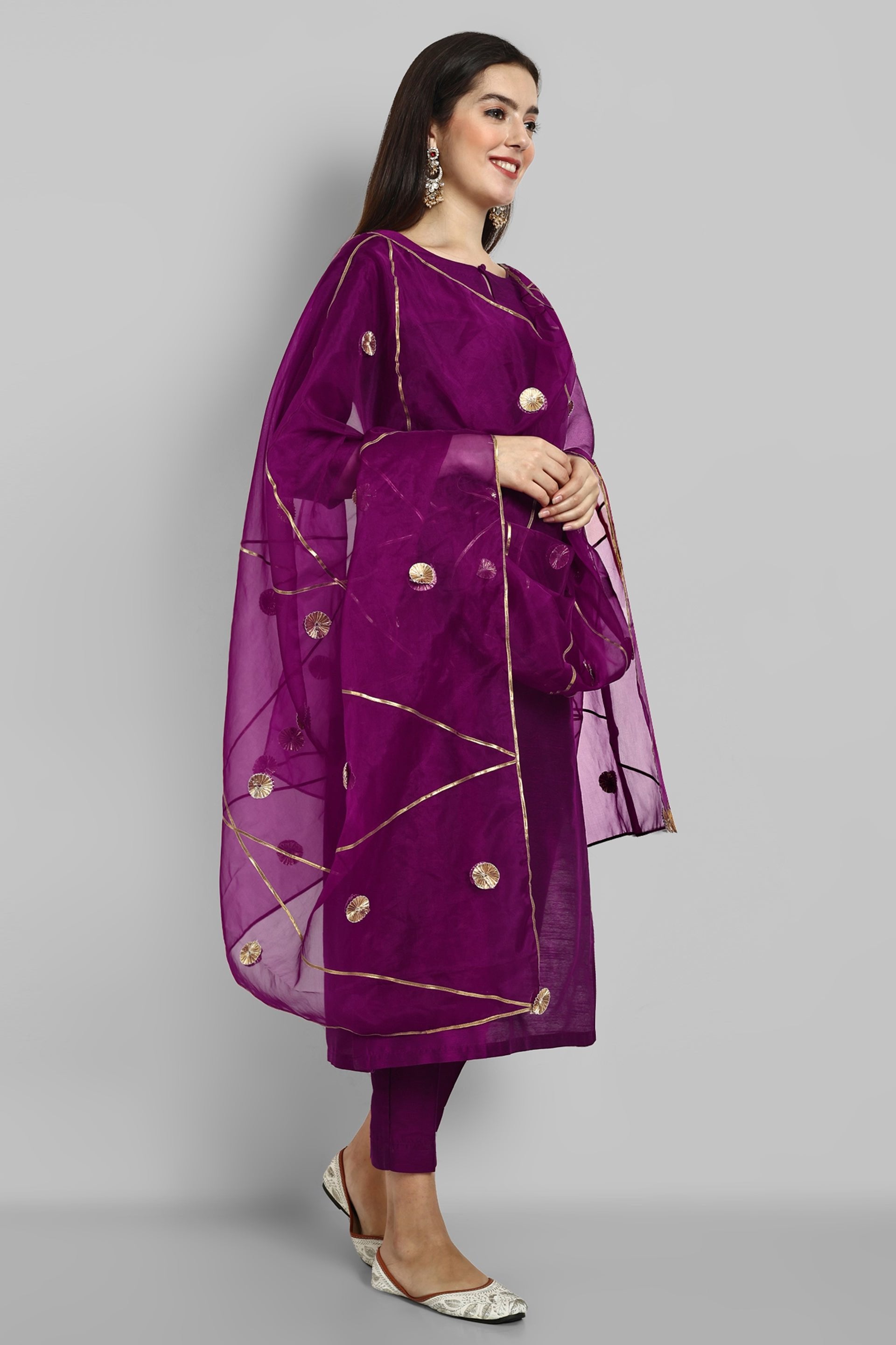 Wine Purple boat neck kurta paired with elasticated pants and an organza dupatta - a stylish set of three for a sophisticated and coordinated look