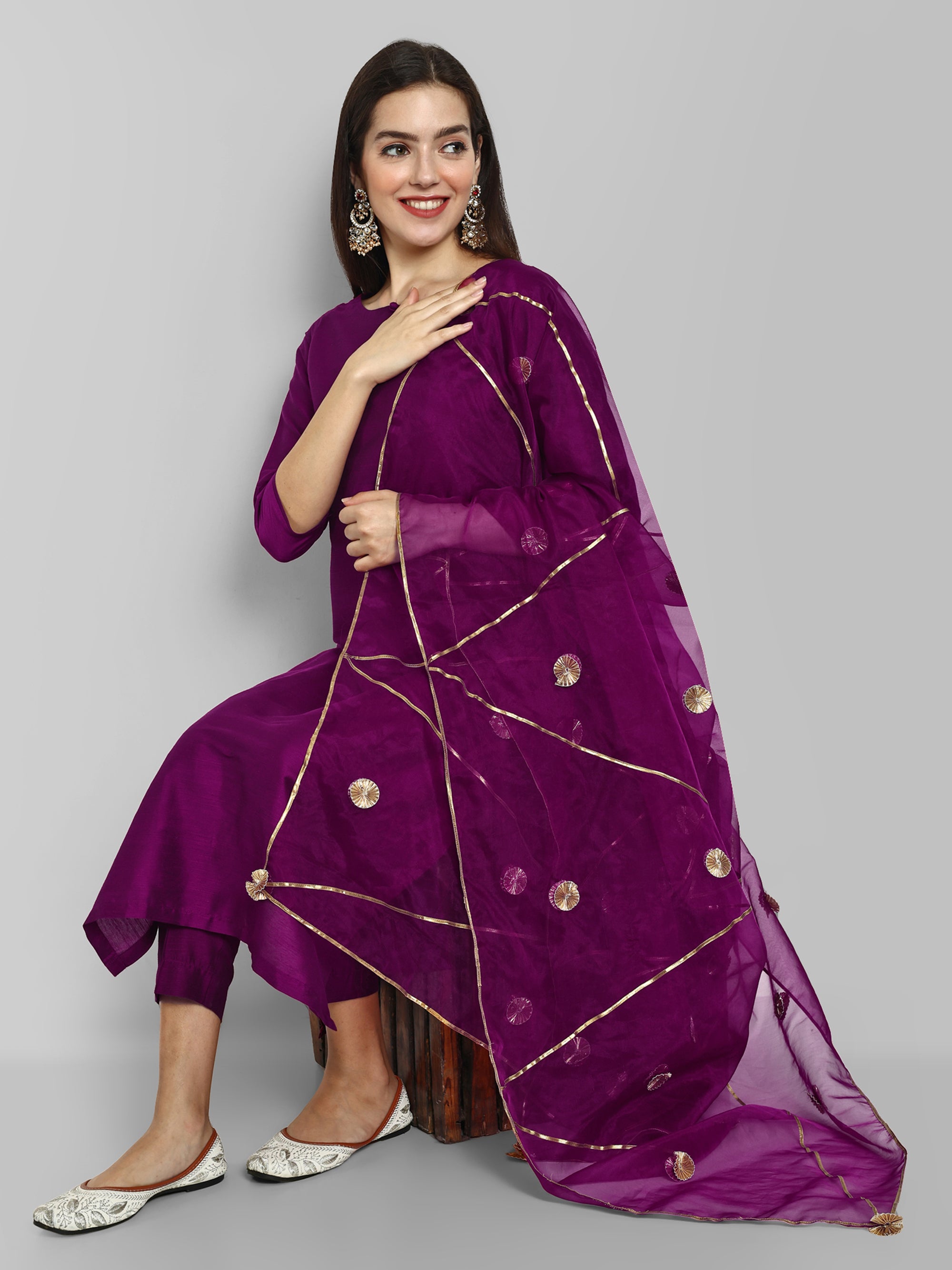 Wine Purple boat neck kurta paired with elasticated pants and an organza dupatta - a stylish set of three for a sophisticated and coordinated look