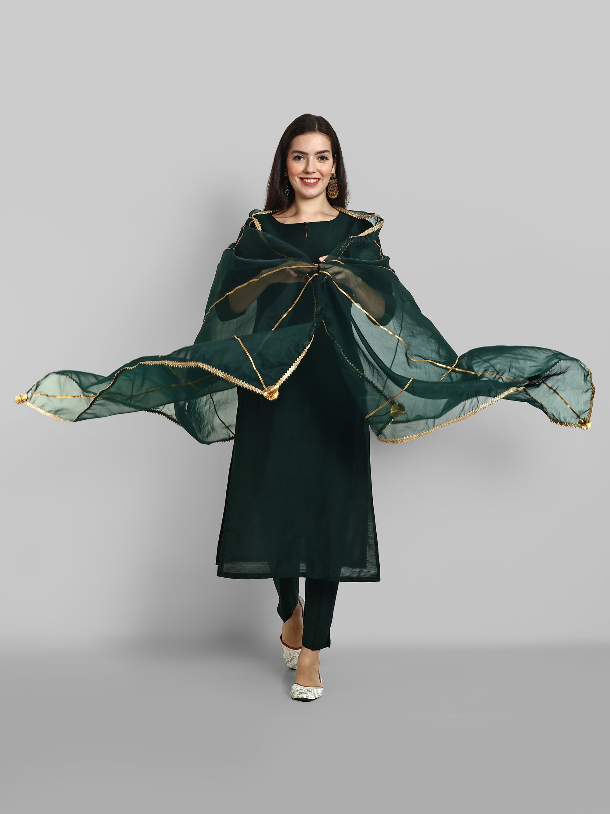 Emerald Bottle Green boat neck kurta paired with elasticated pants and an organza dupatta - a stylish set of three for a sophisticated and coordinated look