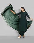 Emerald Bottle Green boat neck kurta paired with elasticated pants and an organza dupatta - a stylish set of three for a sophisticated and coordinated look.