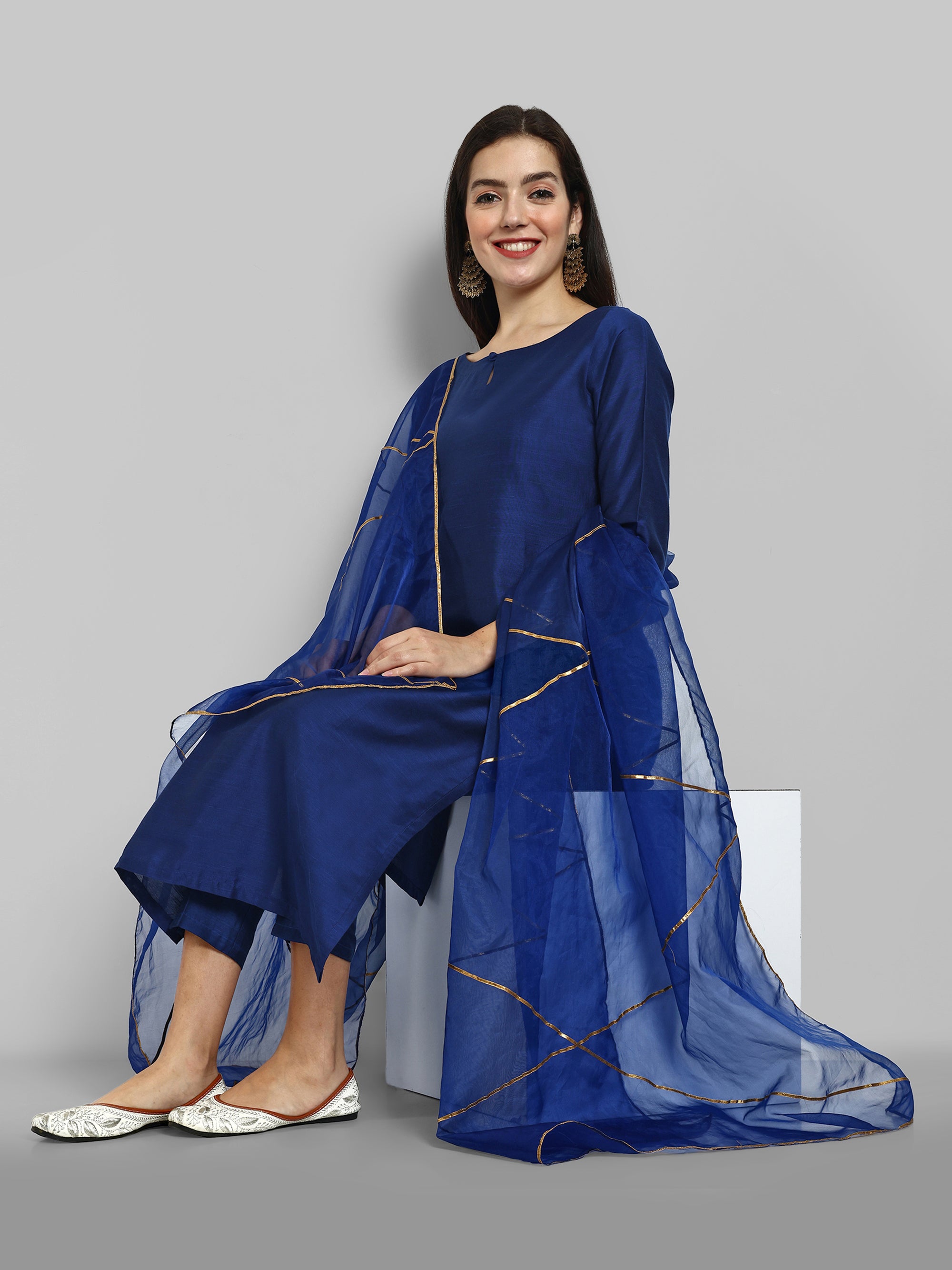 Ink Blue boat neck kurta paired with elasticated pants and an organza dupatta - a stylish set of three for a sophisticated and coordinated look